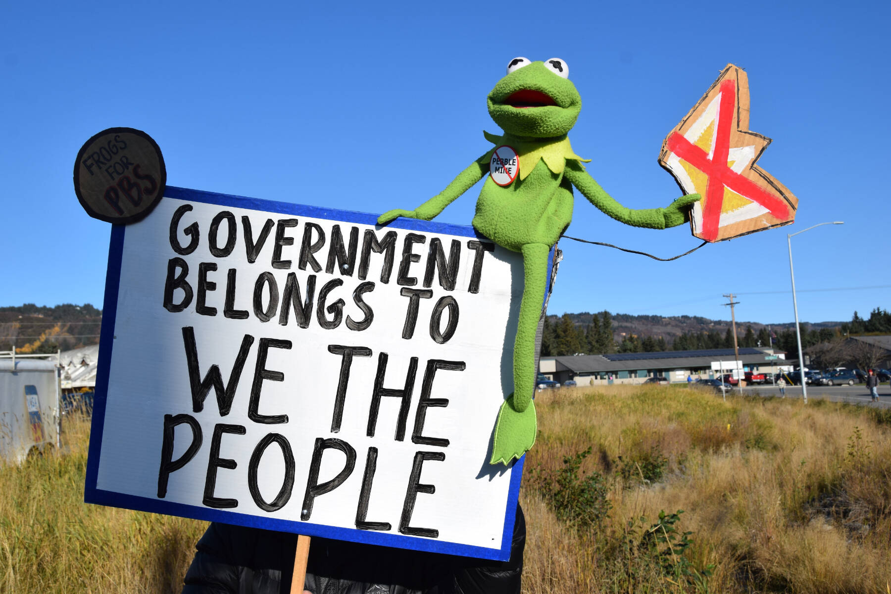 A sign carried by a protester during the “No Kings” demonstration on Saturday, Oct. 18, 2025, in Homer, Alaska, reads “Government belongs to We the People.”