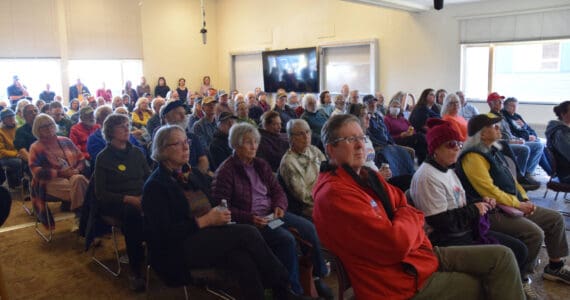 More than 100 community members packed into a combined classroom in Pioneer Hall during the Citizen's Town Hall meeting on Saturday, Oct. 18, 2025, at Kachemak Bay Campus in Homer, Alaska. Approximately 30-40 additional audience members were seated in an overflow area in the Pioneer Hall commons. (Delcenia Cosman/Homer News)