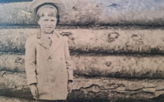 Emmett Krefting, age 6-7, at the Wible mining camping in 1907-07, about the time he first met King David Thurman. (Photo from the cover of Krefting’s memoir, Alaska’s Sourdough Kid)