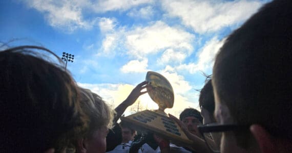 The Homer Mariners varsity football team celebrates their victory after the Division III state championships game on Saturday, Oct. 18, 2025, in Wasilla, Alaska. Photo provided by Justin Zank