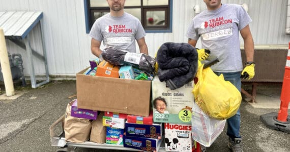 Volunteers for the Western Alaska disaster response receive one of several loads of donations from Homer area community members on Monday, Oct. 27, 2025, at the main drop-off site in Anchorage, Alaska. Photo by Christina Whiting