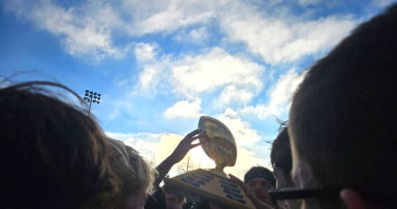 The Homer Mariners varsity football team celebrates their victory after the Division III state championships game on Saturday, Oct. 18, 2025, in Wasilla, Alaska. Photo provided by Justin Zank