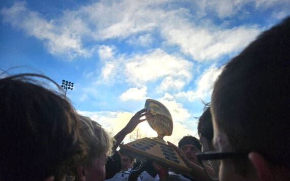 The Homer Mariners varsity football team celebrates their victory after the Division III state championships game on Saturday, Oct. 18, 2025, in Wasilla, Alaska. Photo provided by Justin Zank