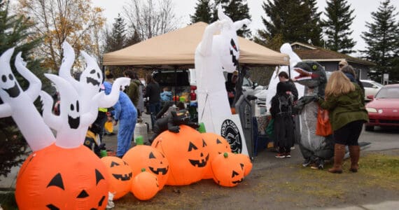 Halloween decorations adorn the parking lot at Alibi during Pioneer Avenue Trick or Treat on Friday, Oct. 31, 2025, in Homer, Alaska. (Delcenia Cosman/Homer News)