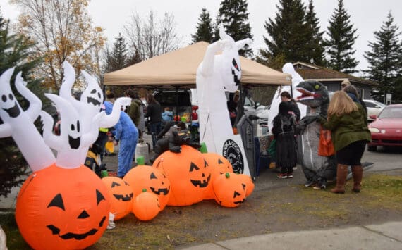 Halloween decorations adorn the parking lot at Alibi during Pioneer Avenue Trick or Treat on Friday, Oct. 31, 2025, in Homer, Alaska. (Delcenia Cosman/Homer News)