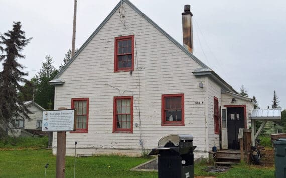 The historic marker in front of this building at 502A Overland Avenue in Kenai identifies the structure as the former headquarters of the Kenai National Wildlife Refuge and the site of the former Agricultural Experiment Station, 1899-1908. Photo by Clark Fair