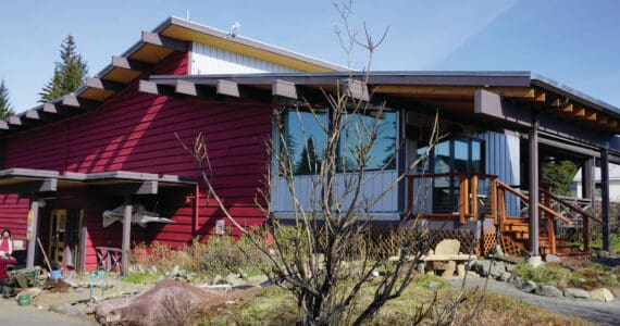 Crews work on the botanical garden on Tuesday, May 18, 2021, at the Pratt Museum in Homer, Alaska. (Photo by Michael Armstrong/Homer News)