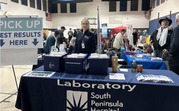 A South Peninsula Hospital employee mans the table for blood test results during the Rotary Health Fair on Saturday, Nov. 8, 2025, at Christian Community Church in Homer, Alaska. Photo provided by South Peninsula Hospital