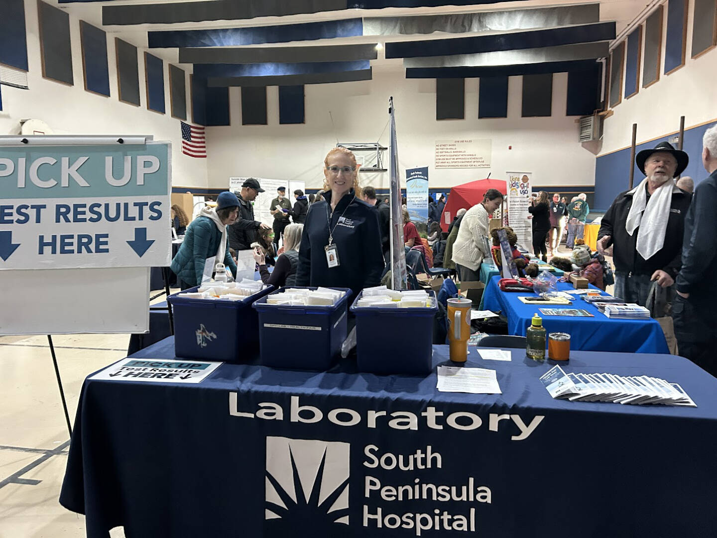 A South Peninsula Hospital employee mans the table for blood test results during the Rotary Health Fair on Saturday, Nov. 8, 2025, at Christian Community Church in Homer, Alaska. Photo provided by South Peninsula Hospital