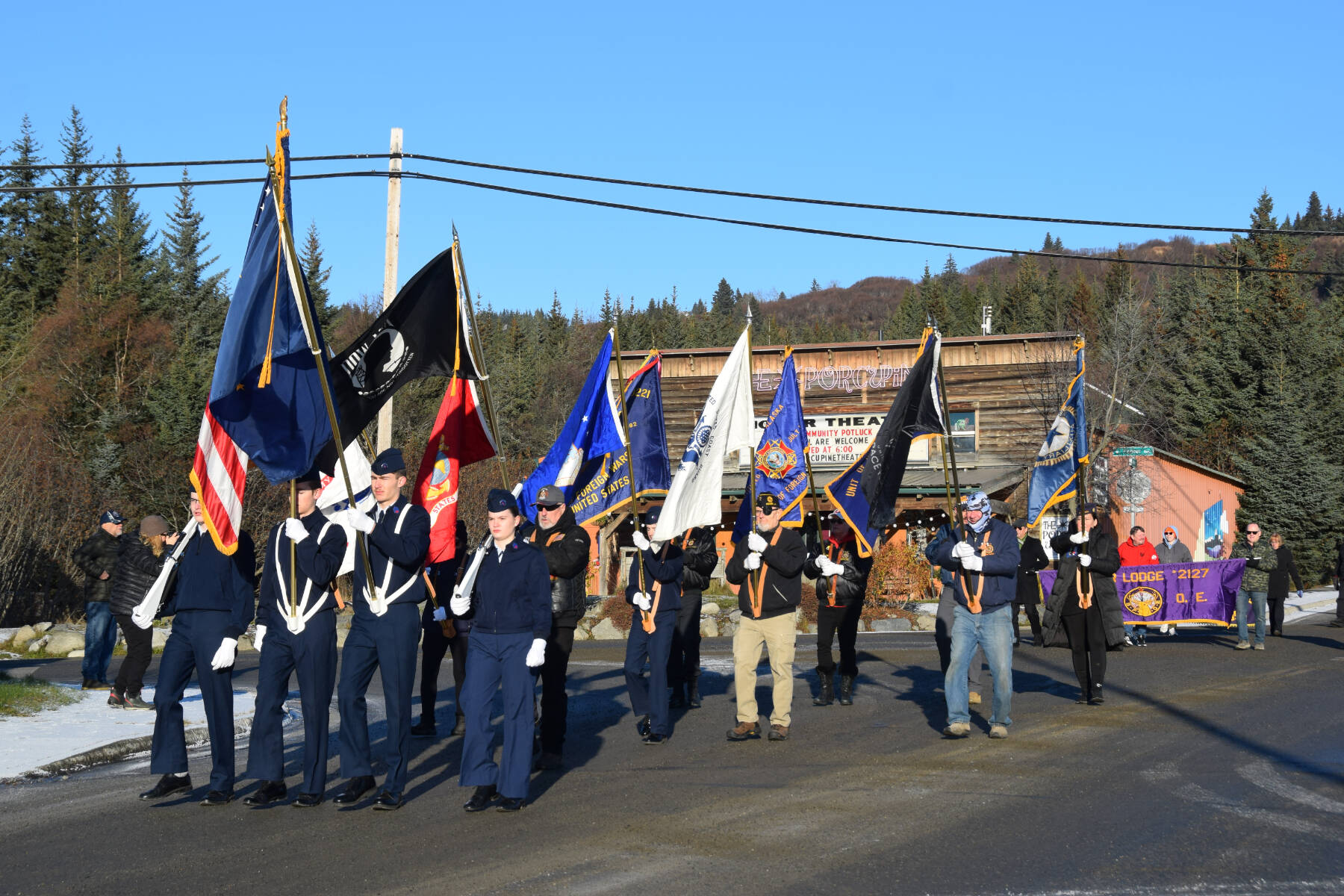 Members of the American Legion Post 16, VFW Post 10221, Civil Air Patrol and Homer Emblem Club #350, as well as local veterans or current military members, march in a parade through Homer, Alaska, in honor of Veterans Day on Tuesday, Nov. 11, 2025. (Delcenia Cosman/Homer News)