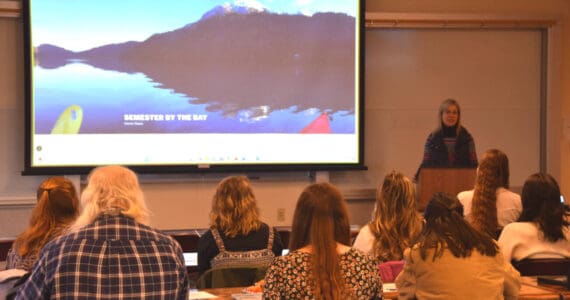 Professor of Biology Debbie Tobin gives an introduction to the audience at the start of the Semester by the Bay Symposium on Friday, Nov. 14, 2025, at Kachemak Bay Campus in Homer, Alaska. (Delcenia Cosman/Homer News)