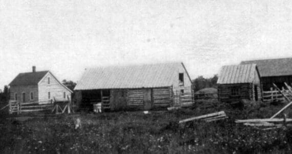 This U.S. Department of Agriculture photograph, from the 1903 report on Alaskan agricultural experiment stations, shows some of the buildings at the Kenai Station, including the superintendent’s main quarters, at far left.
