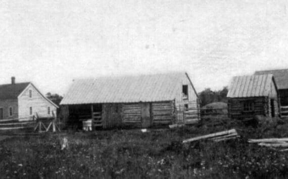 This U.S. Department of Agriculture photograph, from the 1903 report on Alaskan agricultural experiment stations, shows some of the buildings at the Kenai Station, including the superintendent’s main quarters, at far left.