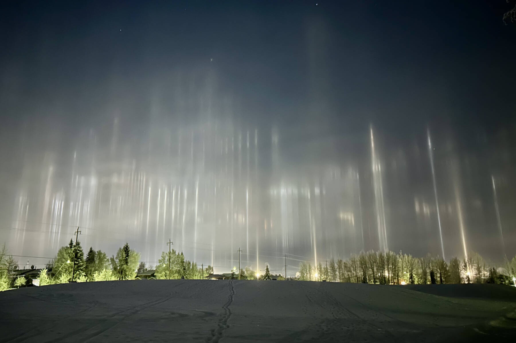 Cindy Bravo saw these light pillars in Fairbanks, Alaska, as she was walking her dog through Bernice Allridge Park on Nov. 11, 2025. Photo by Cindy Bravo.