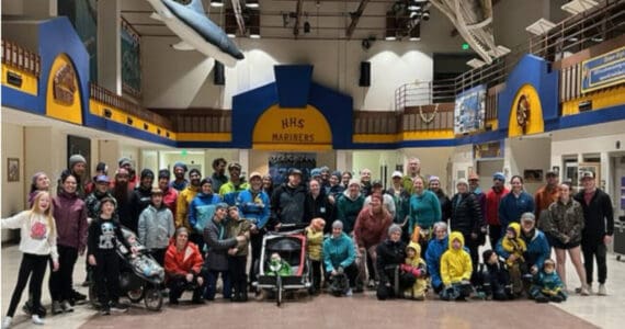 Runners of all ages gather for a photo in the Homer High School Commons after the annual Thanksgiving Turkey Trot on Thursday, Nov. 27, 2025, in Homer, Alaska. Due to icy outdoor conditions, the official run was moved to the high school halls. Photo courtesy Matthew Smith