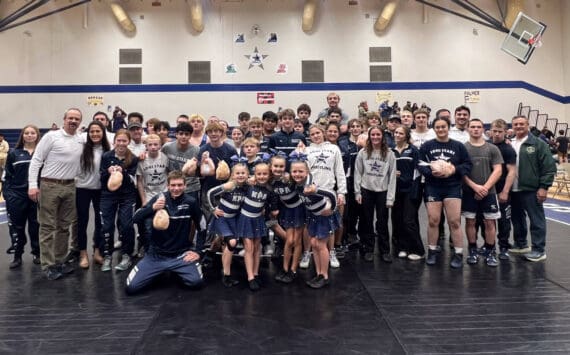 Photo courtesy Pete Dickinson
The SoHi junior varsity and varsity wrestling teams compete in the Battle for the Bird at Soldotna High School on Wednesday, Nov. 26. The Kenai Peninsula Athletics Sapphire dance team performed the halftime show.