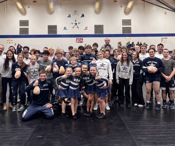 Photo courtesy Pete Dickinson
The SoHi junior varsity and varsity wrestling teams compete in the Battle for the Bird at Soldotna High School on Wednesday, Nov. 26. The Kenai Peninsula Athletics Sapphire dance team performed the halftime show.