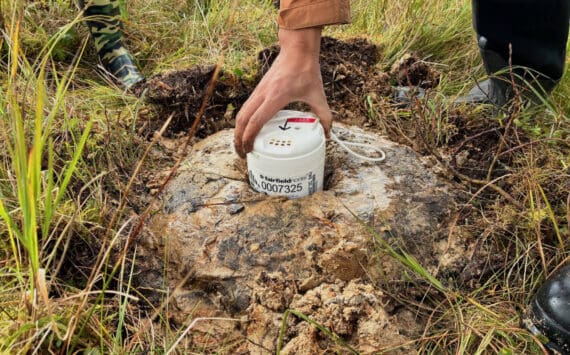 A seismic sensor rests in a “mud pie” on Kodiak Island in Alaska in September 2025. Photo by Cade Quigley