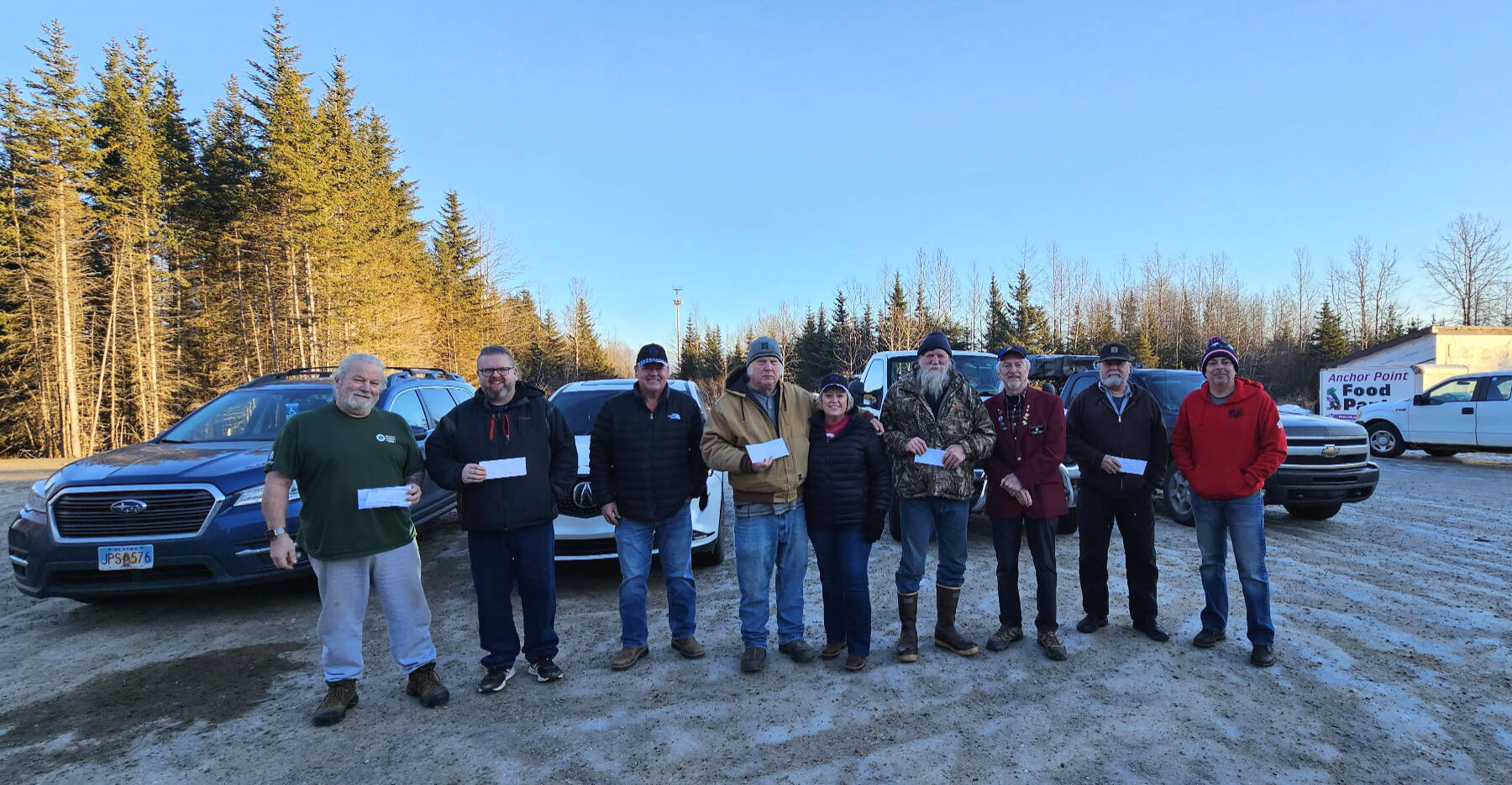 The Homer Elks Lodge #2127 distributes grocery gift certificates to local veterans on Dec. 12, 2025, in Anchor Point, Alaska. Photo provided by Jill Hockema