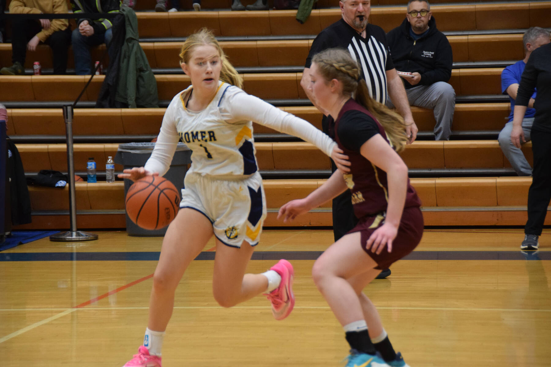 Sophomore Emily Stafford gets around an opponent during the varsity game against Grace Christian on Saturday, Feb. 7, 2026, during the annual Winter Carnival basketball tournament in the Alice Witte Gymnasium at Homer High School in Homer, Alaska. (Delcenia Cosman/Homer News)