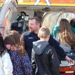 Paramedic Wes Raley shows the inside of a LifeMed helicopter to students from Chapman School on Friday, May 11, 2018 at the school in Anchor Point, Alaska (Photo by Megan Pacer/Homer News)