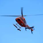 A LifeMed helicopter based out of Soldotna prepares to land in the field behind Chapman School on Friday, May 11, 2018 in Anchor Point, Alaska as part of a demonstration for students. (Photo by Megan Pacer/Homer News)