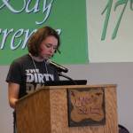 Homer resident Ellie Sythe reads chapter one from her action/adventure novel, On the Wings of a Nightingale, at the open mic session on Monday, June 11, 2018 at the Kachemak Bay Writers Conference at Lands End Resort in Homer, Alaska. (Photo by Delcenia Cosman)