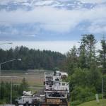 Homer Electric Association crews assess a downed line and pole on Heath Street about 3:15 p.m. Thursday, June 21. The truck in the foreground snagged a low-hanging telephone line, breaking a pole and bringing down a power line. The outage affected about 430 customers in downtown Homer. No one was injured in the incident. (Photo by Michael Armstrong / Homer News)