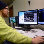 Alaska Department of Fish and Game sonar technician Brandon Key shows off the latest iteration of software and hardware that runs the sonar program on the Kenai River Nov. 1 in Soldotna. Currently there are two sonar sites on the river counting king salmon, one that is used for management and the other a research site which could eventually become the primary sonar on the river. In the weeks since the late run of Kenai River king salmon ended, Key has spent his time analyzing footage from the site that researchers did not have time to watch during the fishing season.