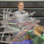 West Homer Elementary Principal Eric Waltenbaugh gets duct taped to the wall in the multipurpose room. Students at West Homer and Fireweed Academy got the reward of plastering duct tape across the principals for filling up a jar with tokens handed out when a student showed good behavior like being respectful and responsible.