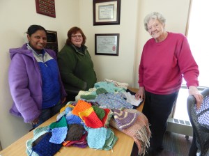 Knitting Circle Wraps Refugees in Warmth