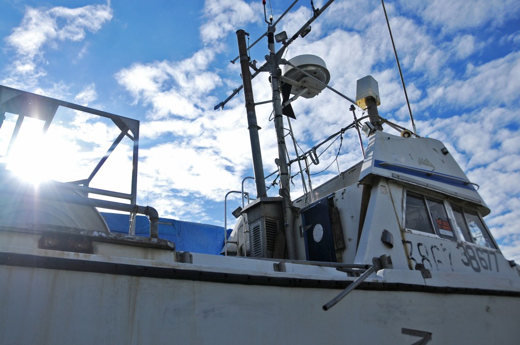 A drift boat is parked near the Copper River Seafoods buying station on the Kenai River in Kenai, Alaska on June 30, 2016. (Elizabeth Earl/Peninsula Clarion, file)