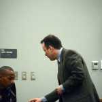 Kenai District Attorney Scot Leaders shows a document to witness James Stevenson during the trial of Demarqus Green on Friday. Green is charged with the murder of Demian Sagerser. Stevenson is Green's cousin and was testifying some of the events during the day on July 7, 2012, when Sagerser was killed.