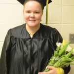 Efimia Basargin poses for a photo after receiving a bachelor of arts in elementary education at Kachemak Bay Campus commencement last Wednesday. She said she hopes to teach in her village of Voznesenka someday.