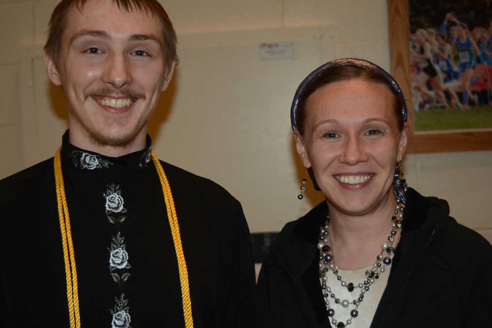 Dennis Martushoff poses for a photo with his mother, Luba Martushoff, after receiving an associate of arts degree at Kachemak Bay Campus commencement last Wednesday.