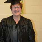 Colleen Behen poses for a photo after receiving an occupational endorsement certificate at Kachemak Bay Campus commencement last Wednesday.
