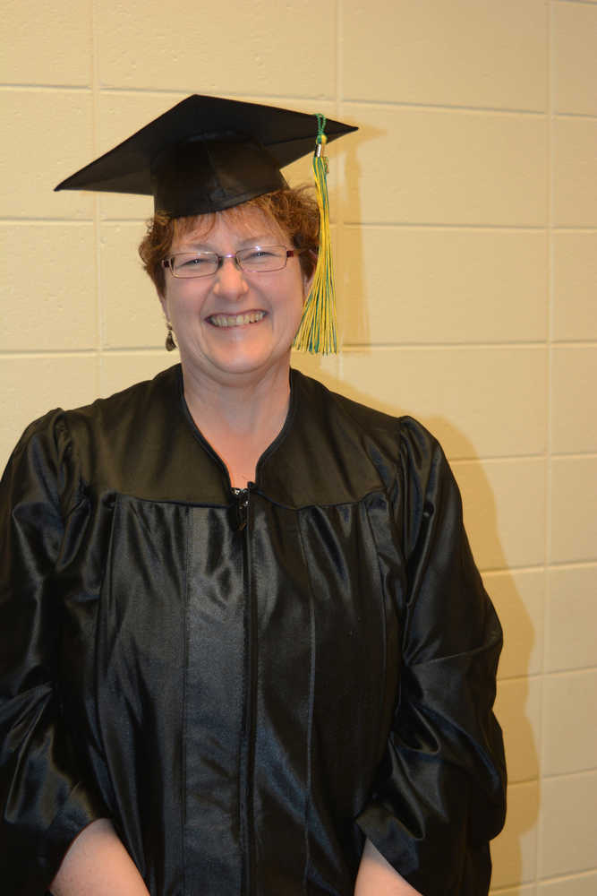 Colleen Behen poses for a photo after receiving an occupational endorsement certificate at Kachemak Bay Campus commencement last Wednesday.