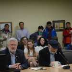 Sen. Gary Stevens, R-Kodiak, and Rep. Paul Seaton, R-Homer, speak at the Homer City Council meeting on Monday night.