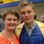 Homer City Council member Catriona Reynolds poses with her son, Ian Lowe, after he graduated from Homer High School on Tuesday.