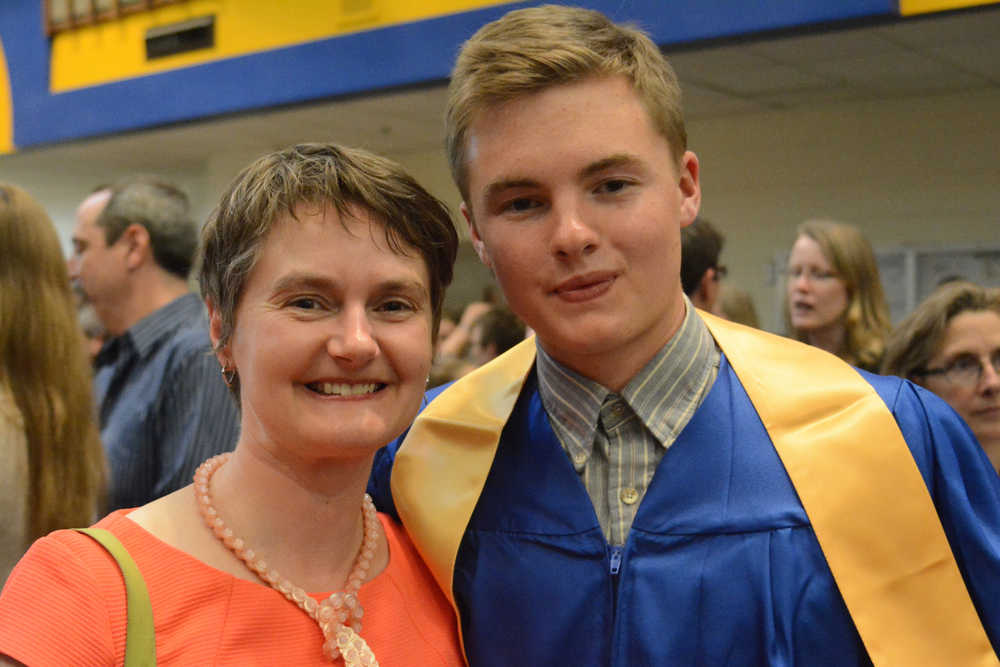 Homer City Council member Catriona Reynolds poses with her son, Ian Lowe, after he graduated from Homer High School on Tuesday.