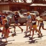 Ralph Broshes, center, in blue shirt, runs in a Spit Run from the 1970s.