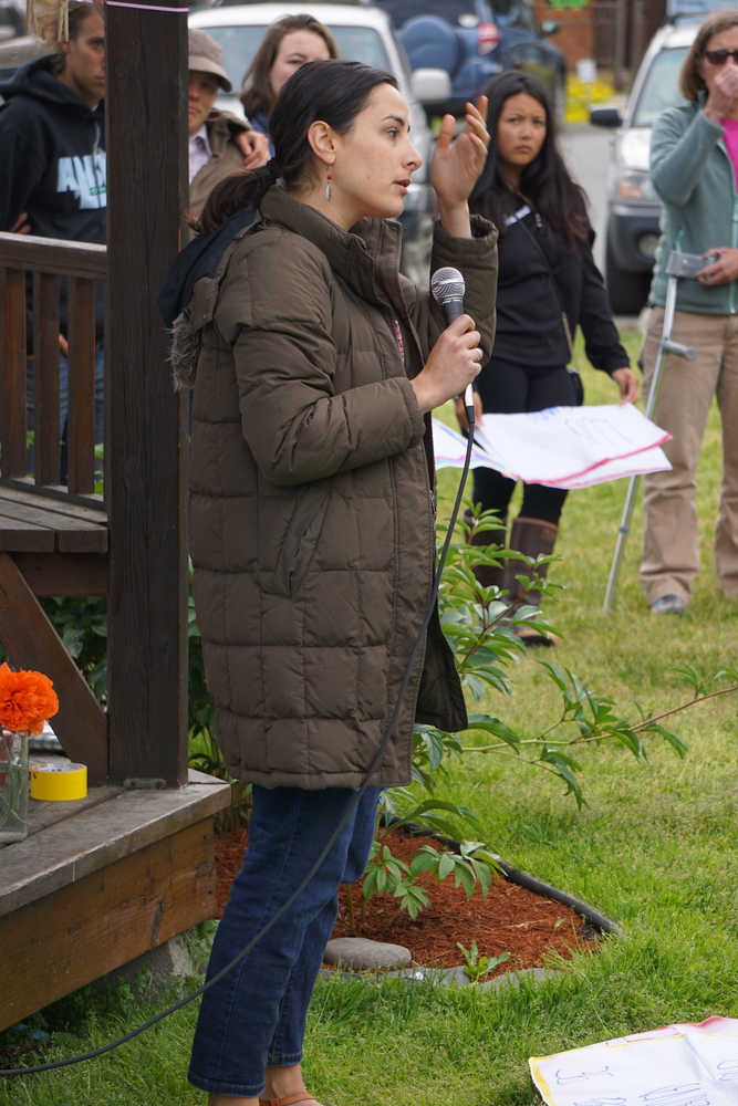 Jordan, a woman visiting from Orlando, speaks at the memorial last Friday. She said she knew of the Pulse nightclub and had friends affected by the tragedy.