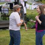 Homer News reporter Anna Frost talks with Rachel Romberg last Friday.