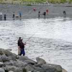Fishermen fish during the incoming tide on Sunday at the Nick Dudiak Fishing Lagoon on the Homer Spit.