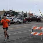Pedro Ochoa runs towards the finish line, full minutes ahead of other competitors, at the Spit Run on Saturday, June 25.