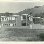 Dr. John B. Fenger worked in South Peninsula Hospital's first building, as shown in this photo taken in 1956. Then known as, Homer Hospital-Health Center, it opened July 1, 1956 with a dental clinic, medical clinic, public health clinic and two-bed hospital, as a Public Utility District of the Territory of Alaska.