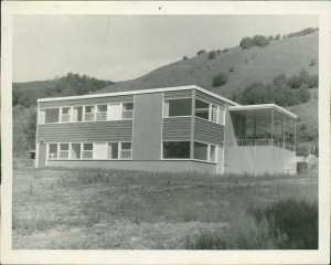 Dr. John B. Fenger worked in South Peninsula Hospital's first building, as shown in this photo taken in 1956. Then known as, Homer Hospital-Health Center, it opened July 1, 1956 with a dental clinic, medical clinic, public health clinic and two-bed hospital, as a Public Utility District of the Territory of Alaska.