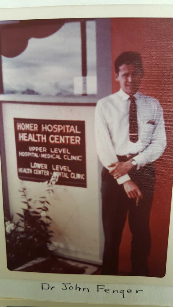 A photo shows Dr. John B. Fenger, Homer's first resident doctor, posing for a picture in front of the Homer Hospital Health Center.