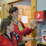 Samantha Cunningham, right, helps Bobby News decide on a location for a public automated external defibrillator at the Anchor Point Senior Center. Cunningham is the Kenai Peninsula Borough Emergency Medical Services coordinator and Ness is president of the senior center board. Cunningham helped get a $43,000 grant from the Tesoro Foundation to install AEDs in public places on the peninsula, including Anchor Point.-Photo by Michael Armstrong, Homer News