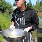 Chef Richard Nell of The Homestead Restaurant gives a demonstration on pickling ginger using a simple brine. Nell started off the Synergy Gardens' First Annual Great Garlic Scape Festival.